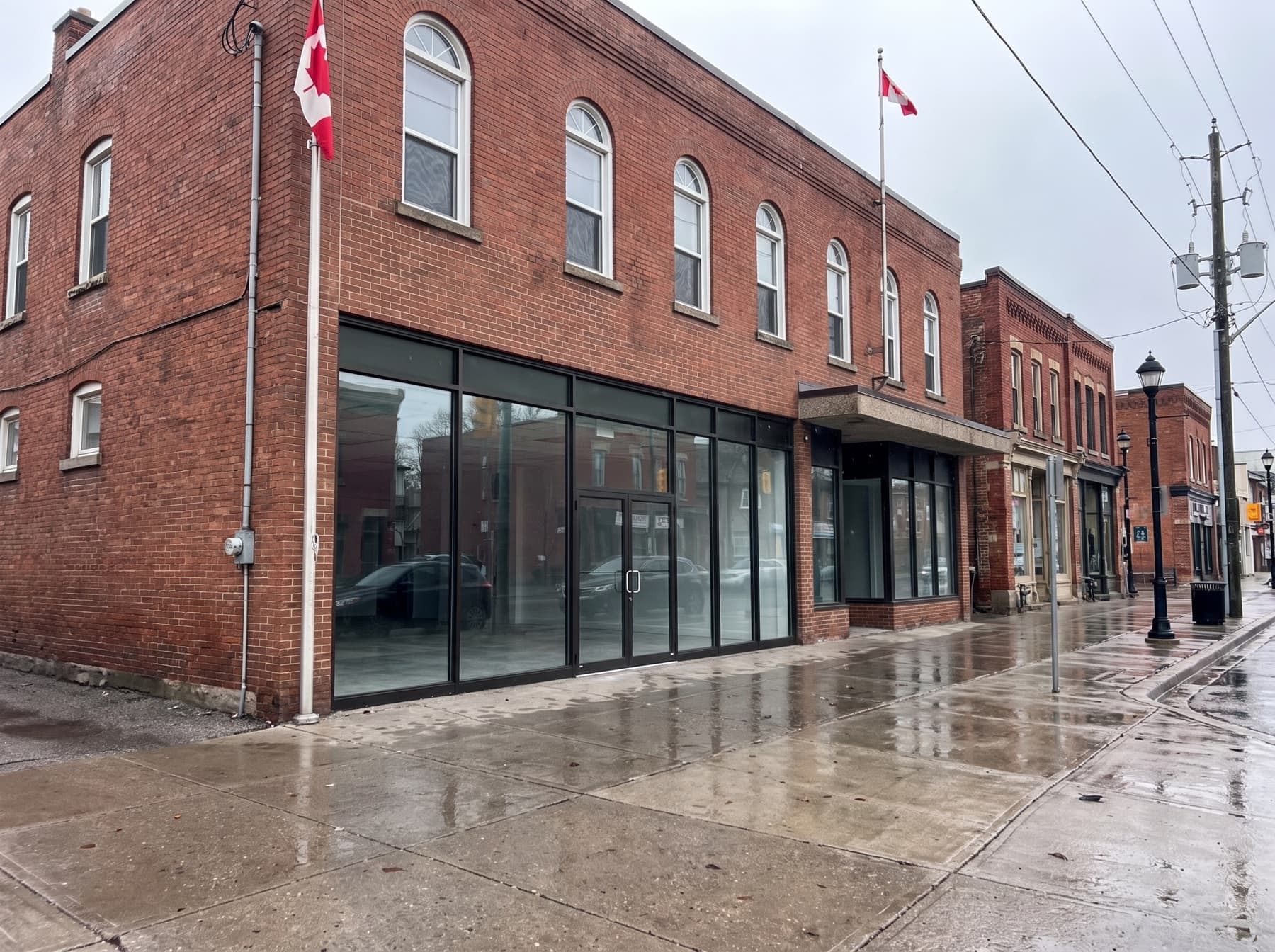 Newmarket Main Street brick commercial building with ground-floor storefront